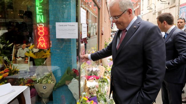 Scott Morrison and Victorian Opposition Leader Matthew Guy visit Pellegrini's cafe in Bourke Street to pay their respects after one of the co-owners was killed in the terror attack. Picture: Stuart McEvoy