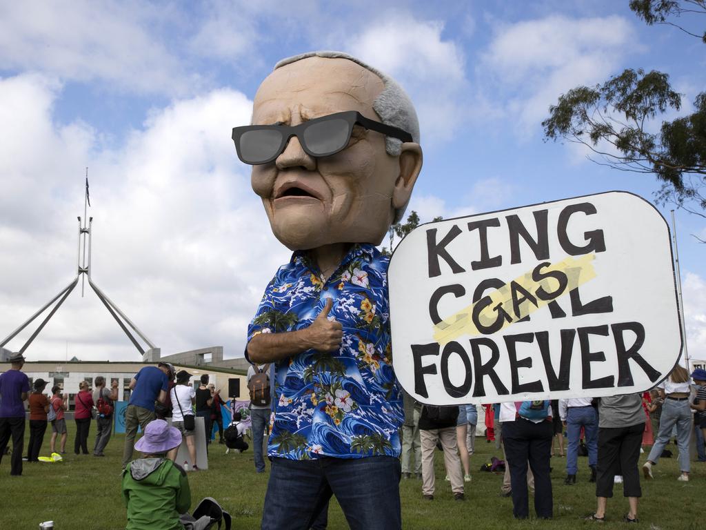 A protester wears a Scott Morrison mask at the People’s Climate Assembly rally. Picture: NCA NewsWire/Gary Ramage