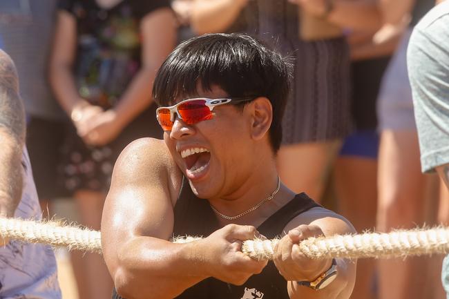 Ricardo Atanacio on the rope for the Mack Trucks team at the 2019 Beer Can Regatta at Mindel Beach. Pic Glenn Campbell