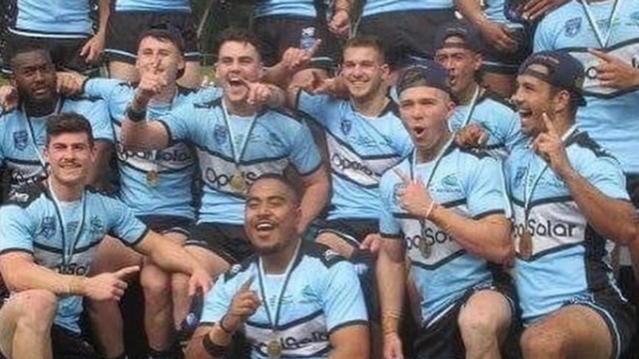 Sharks player Fine Kula (bottom row middle, sitting) who has been diagnosed with brain cancer.