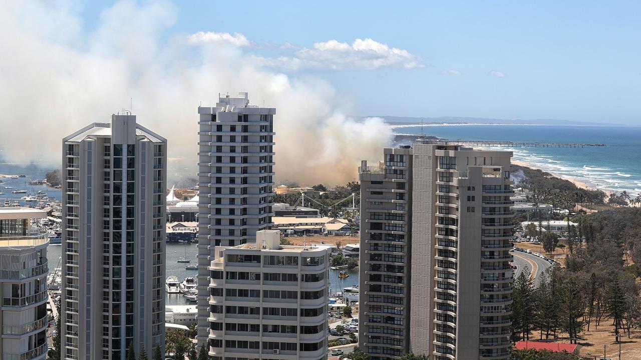 Fire on the Gold Coast Spit seen from Main Beach. Picture: Luke Gracias