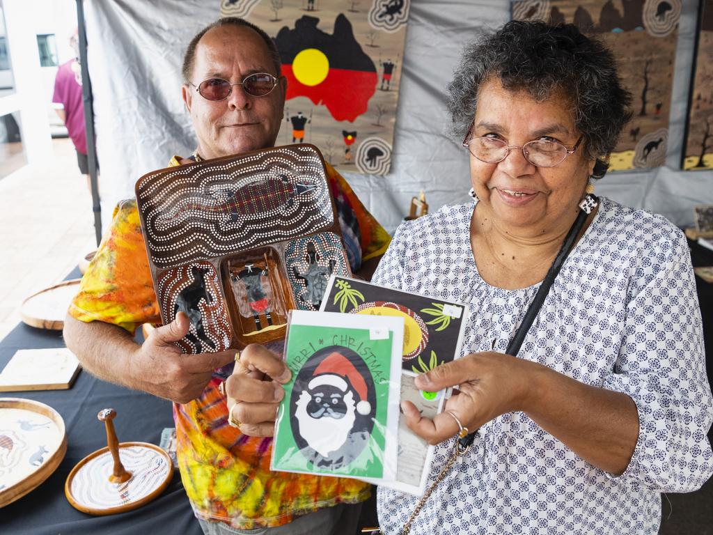 Husband and wife duo Greg and Dee Locke (DG Murri Wood Art and Australian Indigenous Cards) at their stall at the Indigenous Artisan Markets at The Lighthouse, Saturday, December 17, 2022.