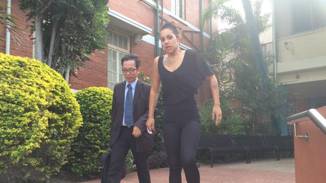 Ms Cody Roberts (right) leaves Gladstone Courthouse with duty lawyer Jun Pepito. Photo Ross Irby / The Observer