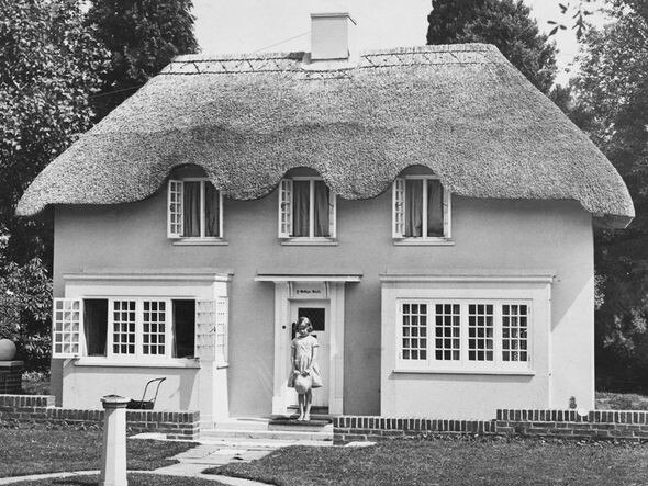 The then Princess Elizabeth outside the cottage in June 1933.