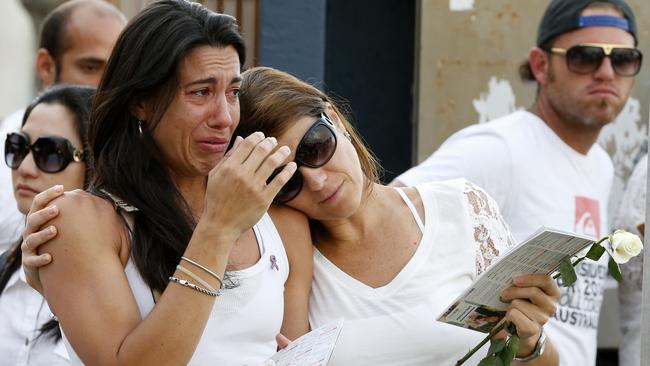 Friends of murdered woman Fabiana Palhares gathering at Burleigh Hill, all wearing white to remember her. Picture: Jerad Williams.