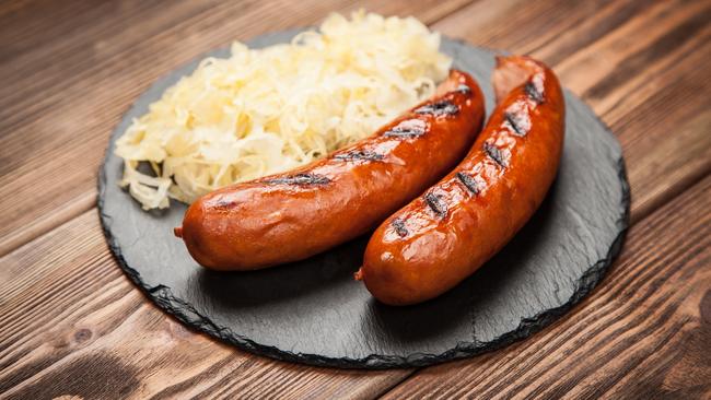 Traditional german food of sauerkraut and bratwurst