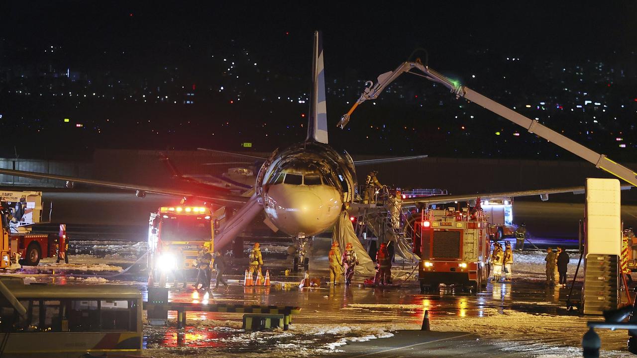 The entire top of the plane was blackened and burnt. Picture: Son Hyung-joo/Yonhap via AP