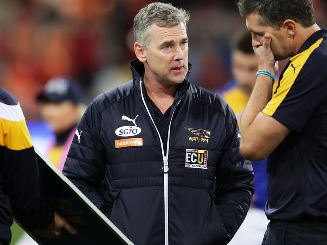 SYDNEY, AUSTRALIA - AUGUST 19:  Eagles head coach Adam Simpson speaks to coaches at three quarter time during the round 22 AFL match between the Greater Western Sydney Giants and the West Coast Eagles at Spotless Stadium on August 19, 2017 in Sydney, Australia.  (Photo by Matt King/Getty Images)