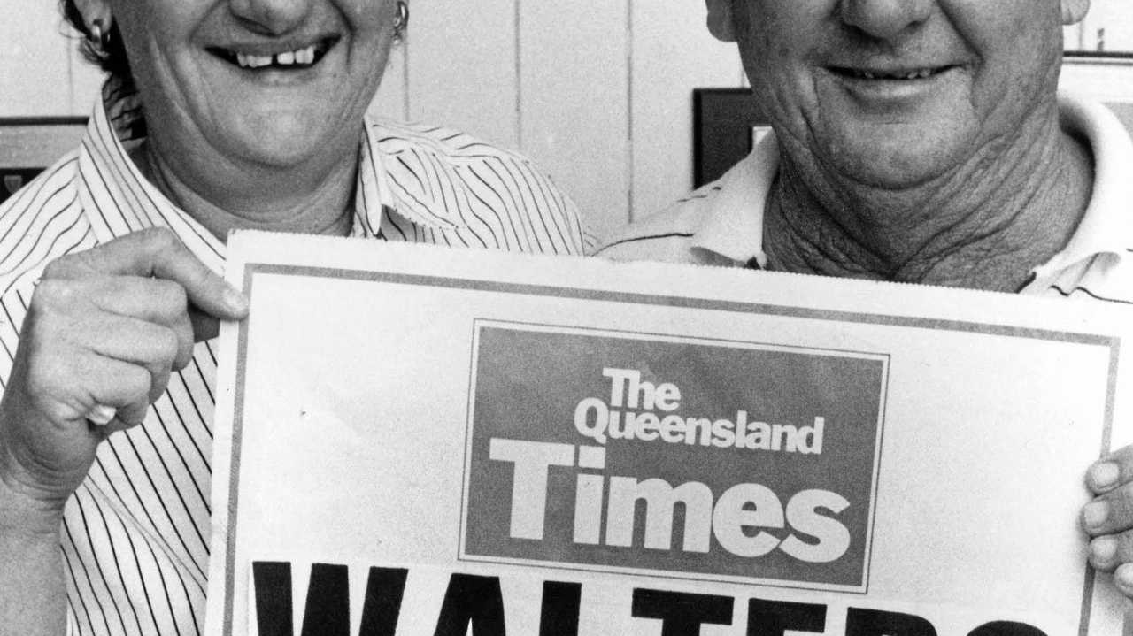 Kevin Walters' proud late parents Sandra and Kevin Snr hold up a QT poster when sons Kevin and Kerrod became the first twins to play league for Australia in 1991. Picture: QT Photographer