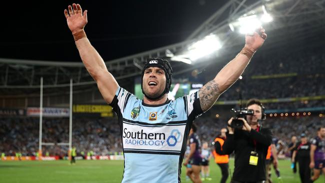 SYDNEY, AUSTRALIA — OCTOBER 02: Michael Ennis of the Sharks celebrates winning the 2016 NRL Grand Final match between the Cronulla Sharks and the Melbourne Storm at ANZ Stadium on October 2, 2016 in Sydney, Australia. (Photo by Cameron Spencer/Getty Images)