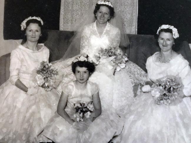 Mrs Hughes (centre) on her wedding day in 1960 with her sisters Dawn and Colleen either side.