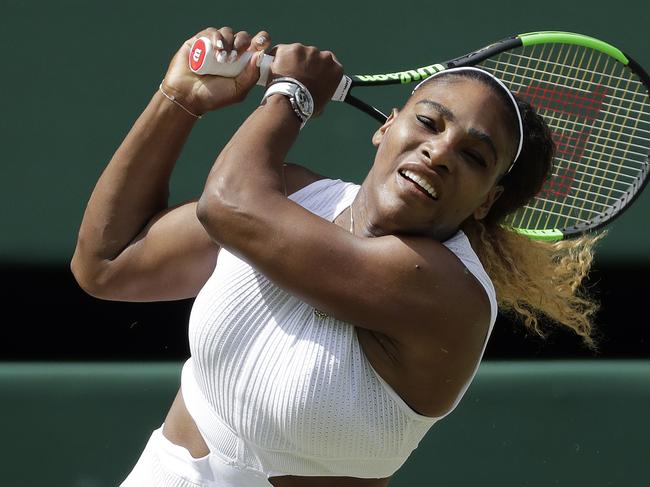 United States' Serena Williams returns to Czech Republic's Barbora Strycova in a Women's semifinal singles match on day ten of the Wimbledon Tennis Championships in London, Thursday, July 11, 2019. (AP Photo/Ben Curtis)