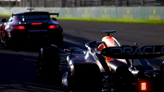 MELBOURNE, AUSTRALIA – APRIL 02: Max Verstappen of the Netherlands driving the (1) Oracle Red Bull Racing RB19 waits in the Pitlane behind the FIA Safety Car during a red flag delay during the F1 Grand Prix of Australia at Albert Park Grand Prix Circuit on April 02, 2023 in Melbourne, Australia. (Photo by Mark Thompson/Getty Images)