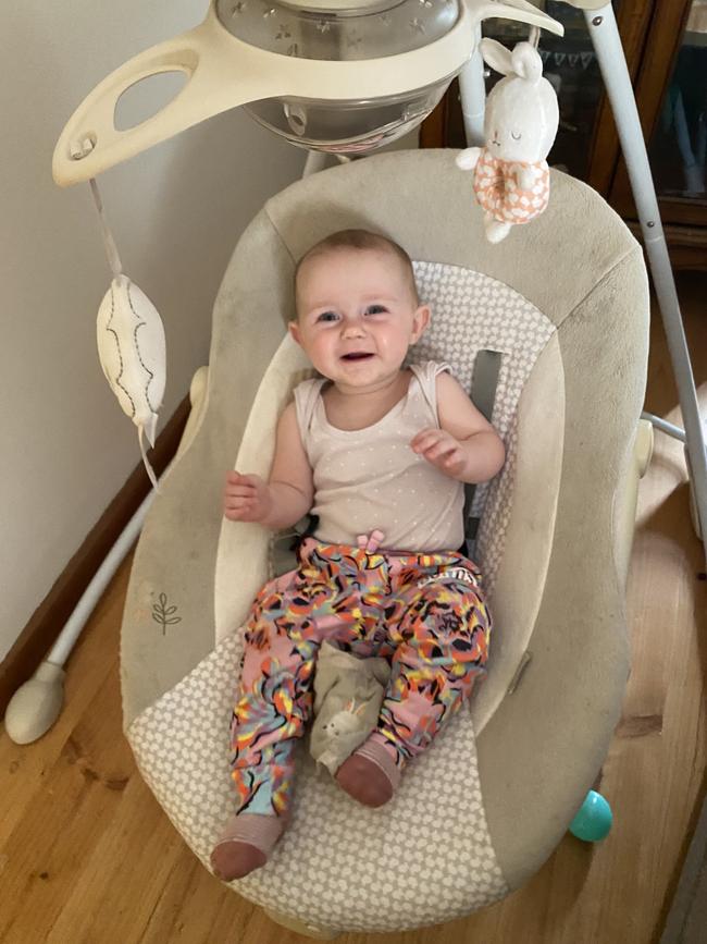 Macy, nine months old. Macy loves to crawl around and get into everything. Sneezing and coughing are her favourite things to laugh at and pretending to be a dinosaur making growing noises is her newest game.