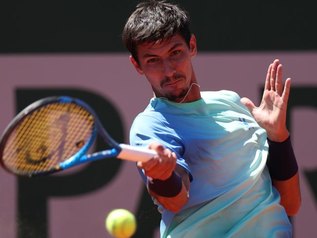 PARIS, FRANCE - MAY 30: Alexei Popyrin of Australia plays a forehand against Nuno Borges of Portugal during the Men's Singles Third Round match on Day Six of the 2025 French Open at Roland Garros on May 30, 2025 in Paris, France. (Photo by Adam Pretty/Getty Images)