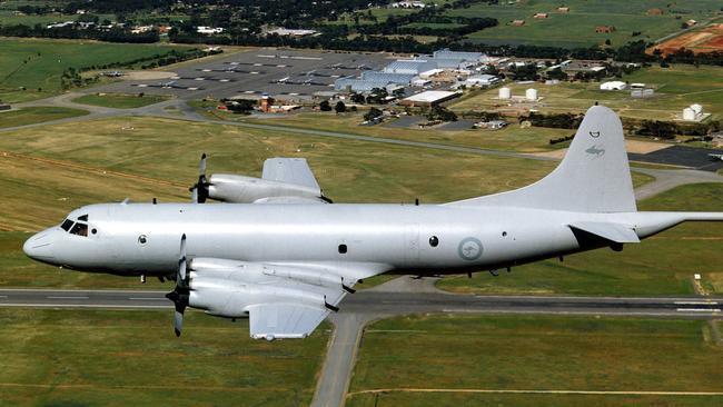 A RAAF antisubmarine Orion aircraft flying over the Edinburgh RAAF base.