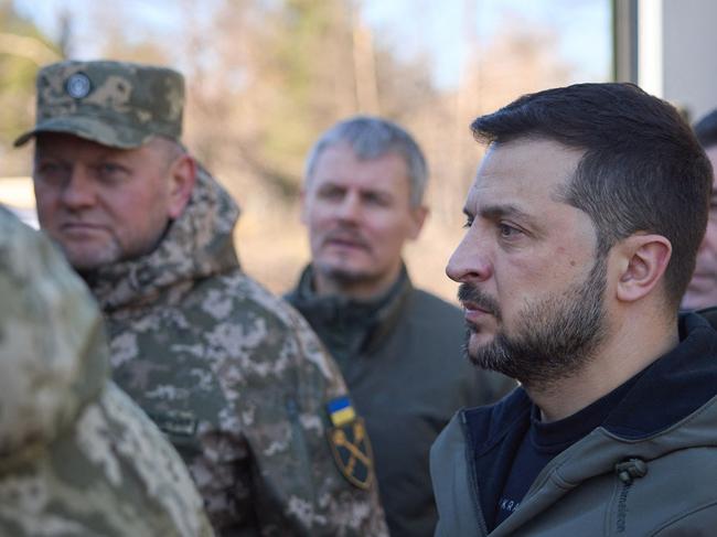 (FILES) This file handout photograph taken and released by Ukrainian Presidential Press Service on November 3, 2023, shows Ukraine's President Volodymyr Zelensky and Commander-in-Chief of the Ukrainian Armed Forces Valeriy Zaluzhny (2nd L) visiting a training center to mark the 