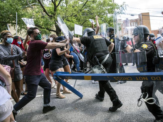 Protesters and police clash in Columbia, South Carolina. Picture: AP