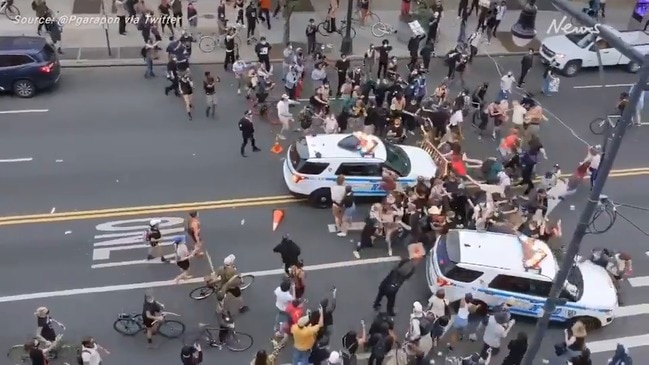 Horror as NYPD vehicle drives into protesters