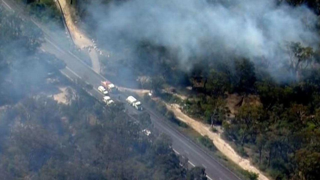 Emergency services near the fire which was caused by a plane crash, in which two people were killed. Picture: 9News