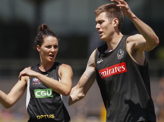 Mason Cox (right) gives Sharni Layton some pointers.