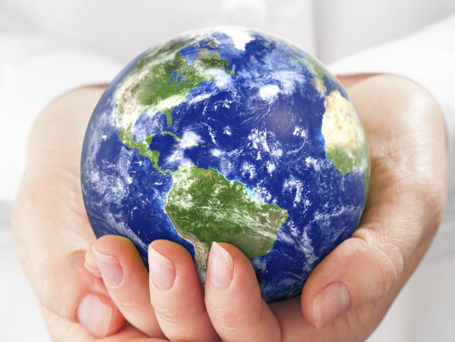 Buying property around the globe. Thinkstock 460363333. World in your hands.