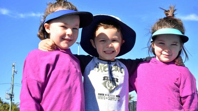 Isabel Cook, 6, Jake Hoffmann, 4, and Jessica Cook, 4 , at Maranoa Basketball Association's holiday netball clinic. Picture: Ellen Ransley