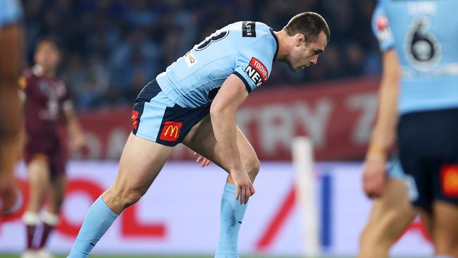 SYDNEY, AUSTRALIA – JUNE 08: Isaah Yeo of the Blues stumbles after being hit while making a tackle during game one of the 2022 State of Origin series between the New South Wales Blues and the Queensland Maroons at Accor Stadium on June 08, 2022, in Sydney, Australia. (Photo by Mark Kolbe/Getty Images)