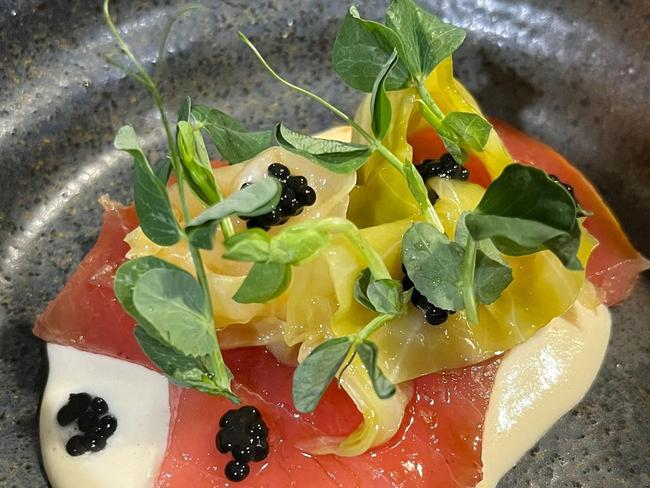 Izy Aki Pop up restaurant at The Roscks, Sydney. Southern blue fin tuna, macadamia and soy milk, shellfish poached hispi, avruga, pea shoots. Photo: Instagram / Suppiled