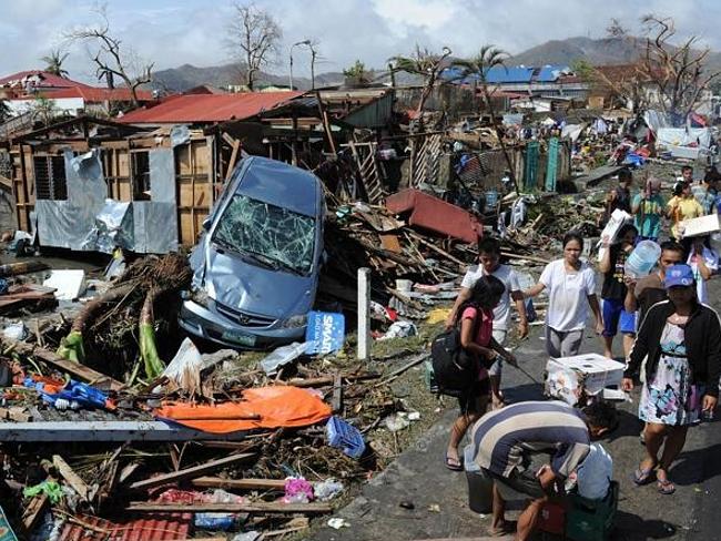 Central Coast Filipinos wait for news of families after typhoon ...