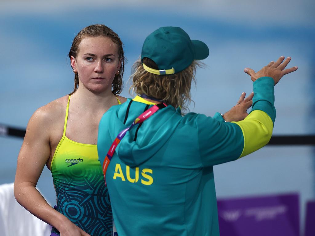 The Terminator Ariarne Titmus talks tactics with coach Dean Boxall. Picture: Michael Klein