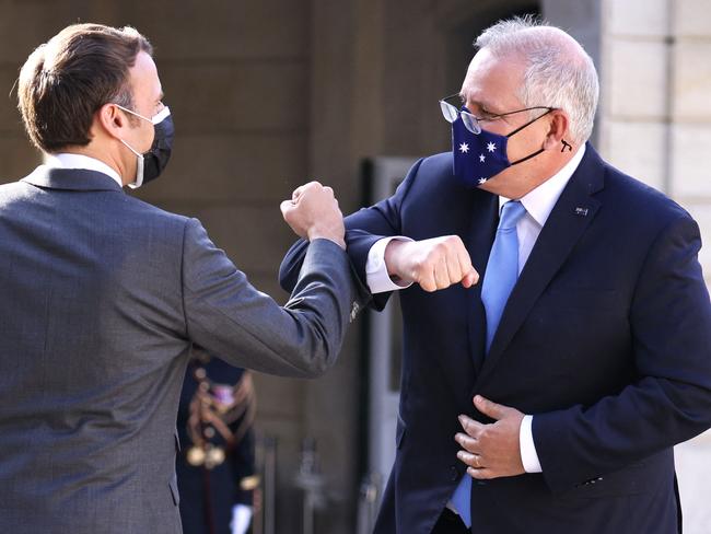 French President Emmanuel Macron greets Scott Morrison at the Elysee Palace in Paris. Picture: AFP