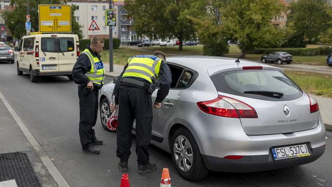 German federal police check cars arriving at the German-Polish border in September. Picture: Getty Images