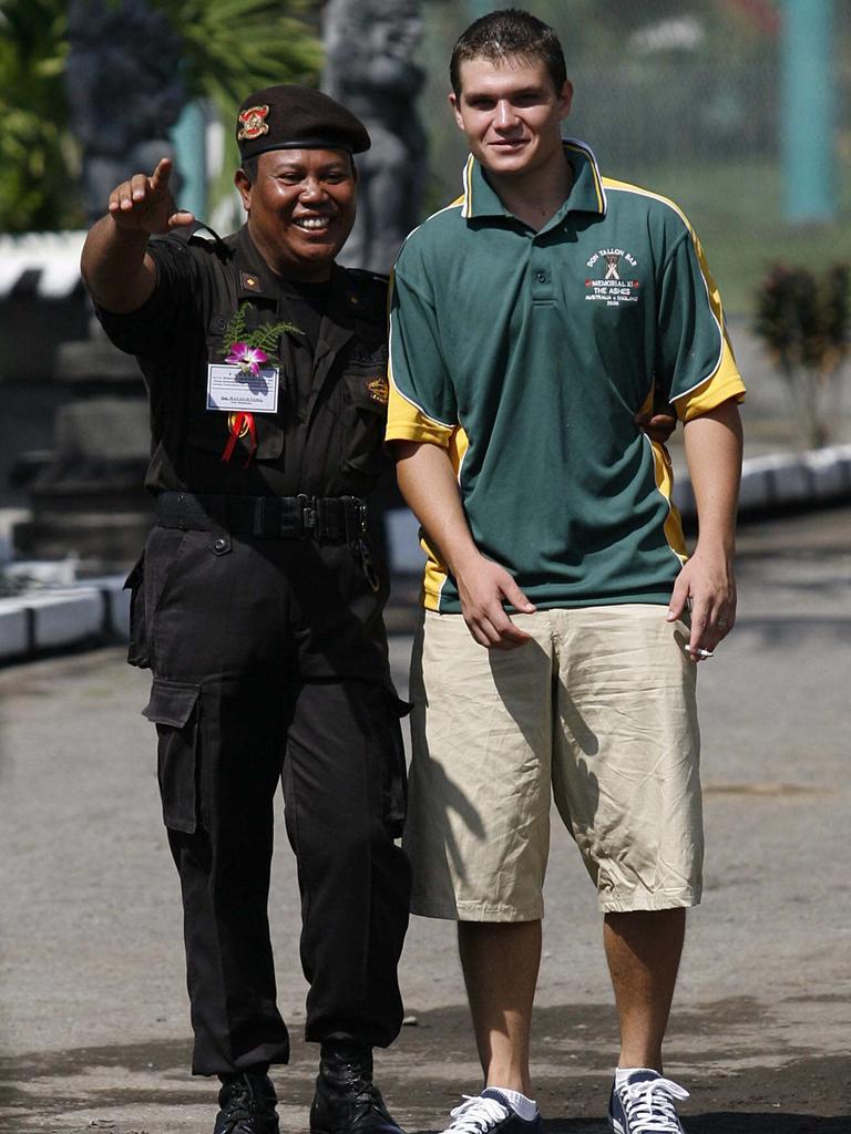 Rush with a jail guard in 2006. Picture: Lukman S Bintoro.