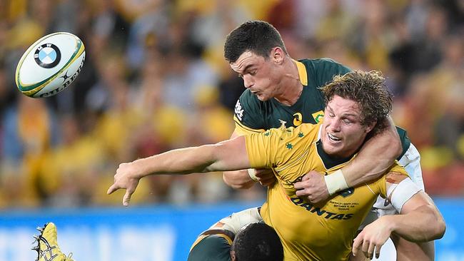 Michael Hooper of the Wallabies loses the ball in the tackle of Springboks centre Jesse Kriel.