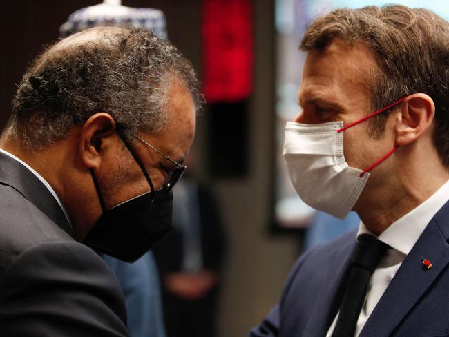 French President Emmanuel Macron (R) and WHO Director-General Tedros Adhanom Ghebreyesus at the EU African Union summit in Brussels. Picture: AFP