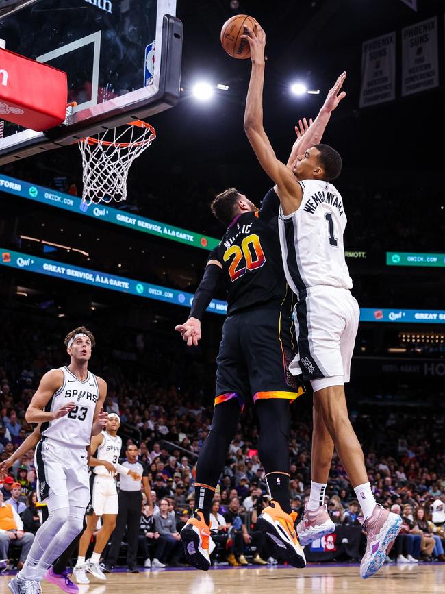 Wembanyama dunks on Jusuf Nurkic. Photo: Mike Christy/Getty Images/AFP