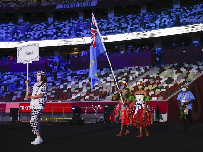 Flag bearers Matie Stanley and Karalo Hepoiteloto Maibuca of Team Tuvalu during the Opening Ceremony of the Tokyo 2020 Olympic Games at Olympic Stadium on July 23, 2021 in Tokyo, Japan. Picture: Jamie Squire/Getty Images