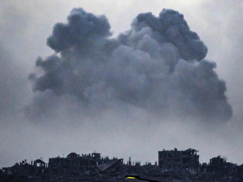 This picture taken from southern Israel near the border with the Gaza Strip shows smoke billowing after an Israeli strike on northern Gaza on November 23, 2023, prior to the four-day ceasefire starting. Picture: AFP