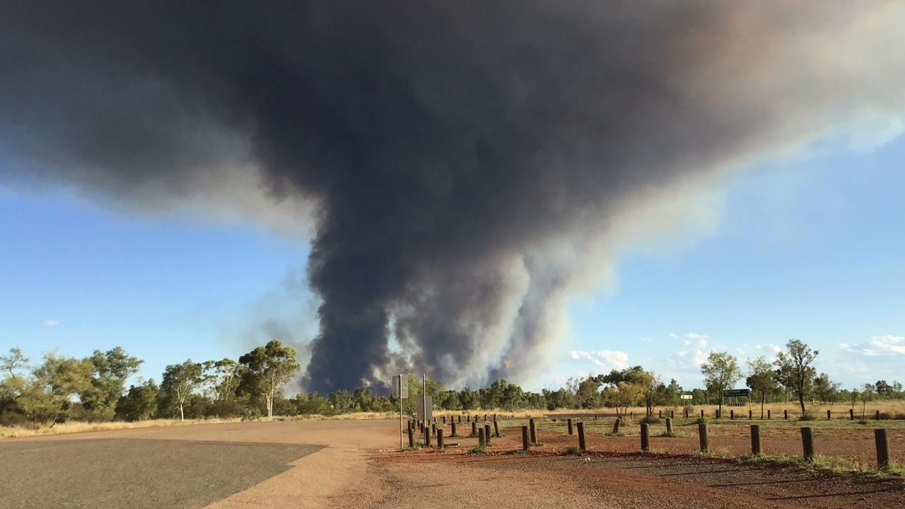 Smoke impacted the Stuart Hwy on Sunday from a fire north of Wycliffe Well. Picture: BushfiresNT.