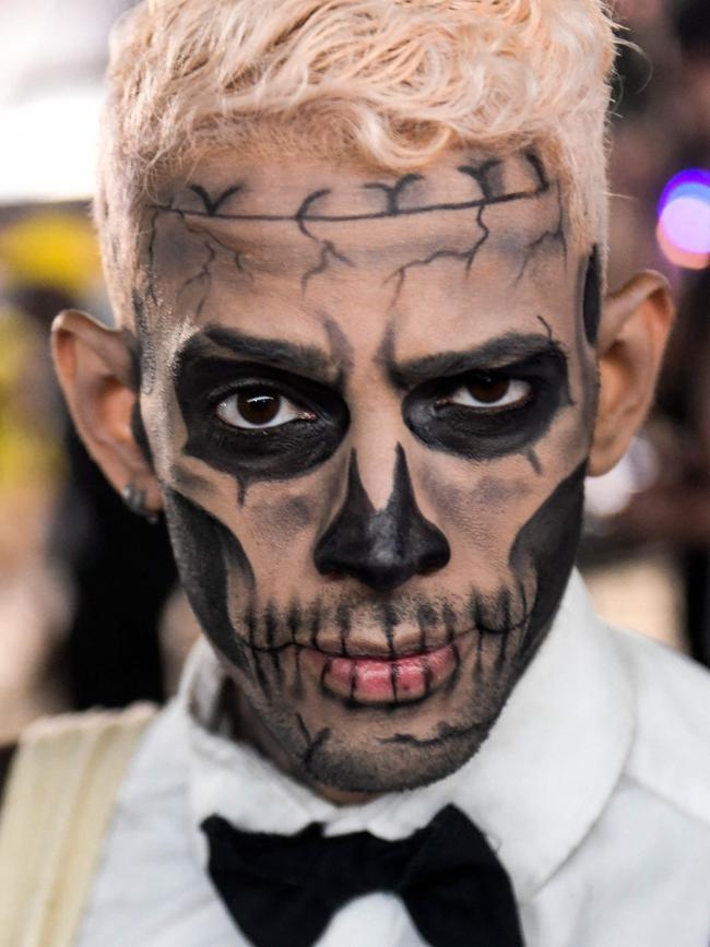 A fan poses for pictures before the mega-concert of US pop star Lady Gaga. Picture: AFP