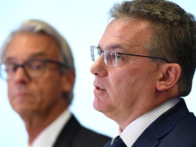 FFA CEO David Gallop (left) and FFA Chairman Chris Nikou address media in Sydney, Thursday, December 13, 2018. The A-League will expand to 12 teams in the next two seasons after FFA decided to award licences to new teams based in Western Melbourne and South West Sydney. (AAP Image/Dan Himbrechts) NO ARCHIVING