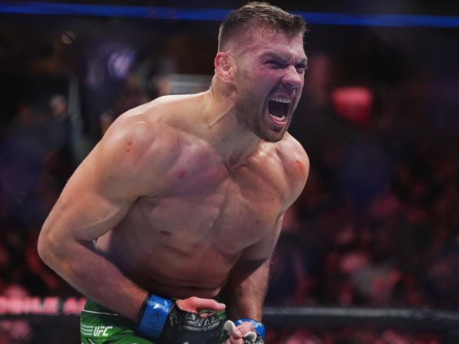 Du Plessis celebrates his win over Whittaker. Picture: Cooper Neill/Zuffa LLC via Getty Images