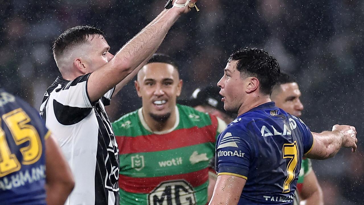 SYDNEY, AUSTRALIA - JULY 04: Referee Liam Kennedy sends Mitchell Moses of the Eels to the sin bin during the round 18 NRL match between Parramatta Eels and South Sydney Rabbitohs at CommBank Stadium, on July 04, 2024, in Sydney, Australia. (Photo by Cameron Spencer/Getty Images)