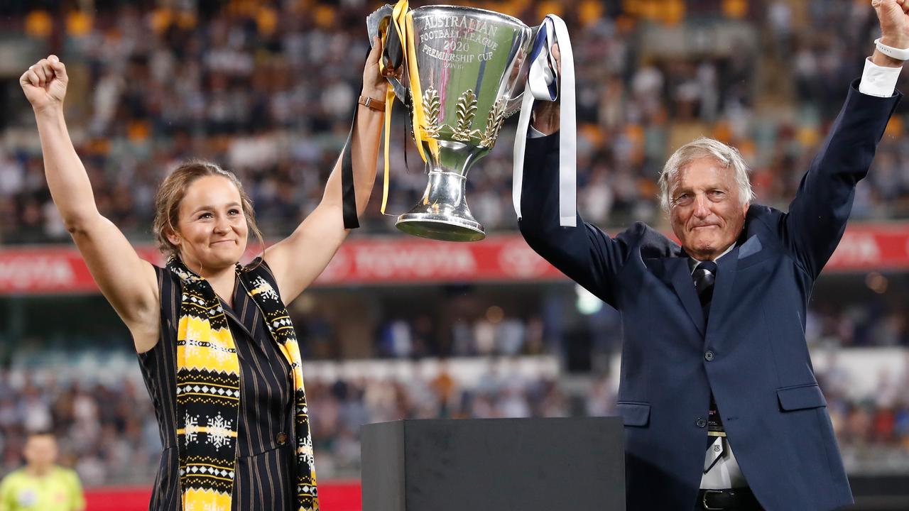 Australia’s Ash Barty, with Geelong legend Ian Nankervis, had the honour of presenting Richmond with the 2020 premiership cup. Picture: Michael Willson