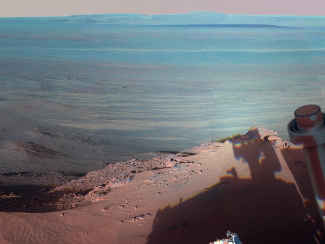 NASA's Mars Rover Opportunity catches its own late-afternoon shadow in this dramatically lit view eastwards across Endeavour Crater on Mars. Picture: Universal History Archive/UIG via Getty Images