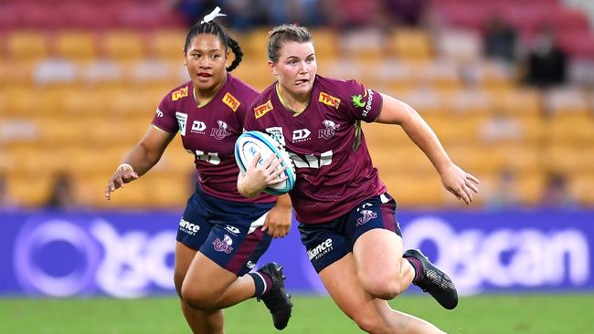 Briana Dascombe of the Reds on the burst against the Melbourne Rebels last year.