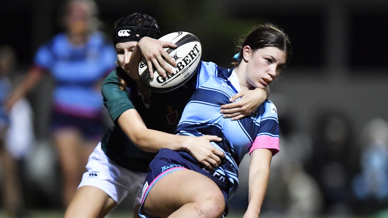 St John's College player Greta Gowen runs the ball during last year’s grand final. Picture: Patrick Woods