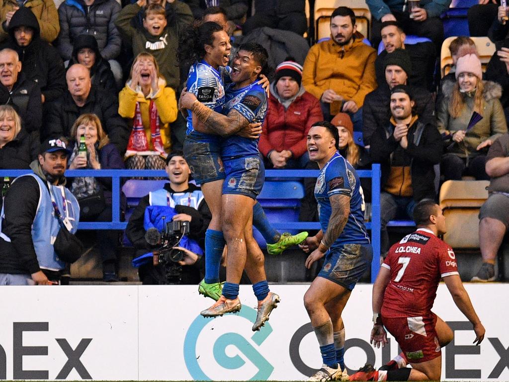 Samoa's Brian To'o (C) celebrates with Jarome Luai (L) after scoring a try. Picture: Oli Scarff/AFP