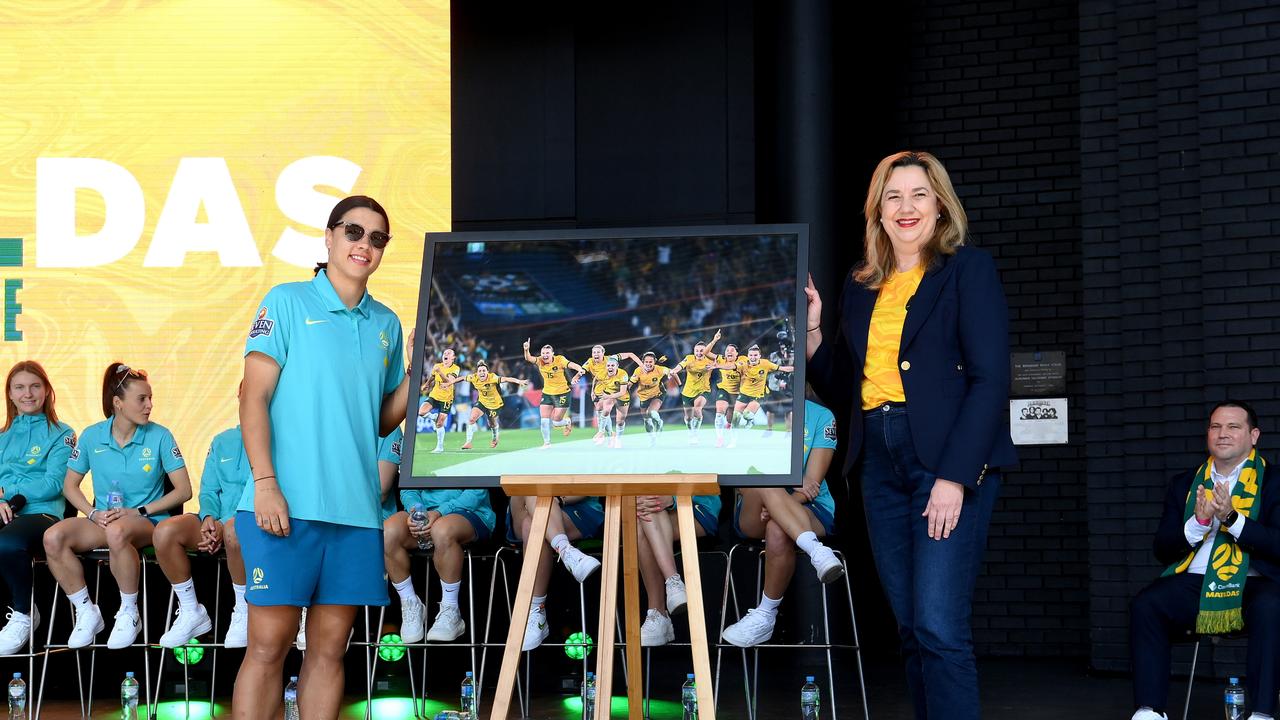 Sam Kerr and Annastacia Palaszczuk unveil a photo memento that will become a statue outside Suncorp Stadium. (Photo by Bradley Kanaris/Getty Images)